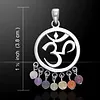 Ohm symbool met chakra steentjes