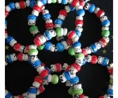 Armbandje met gelukspoppetjes