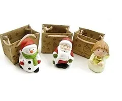 Engel sneeuwpop of kerstman in cadeauzakje
