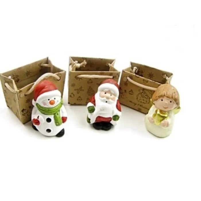 Engel sneeuwpop of kerstman in cadeauzakje