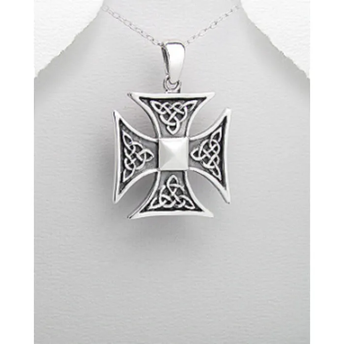 Kruis met triquetra symbolen