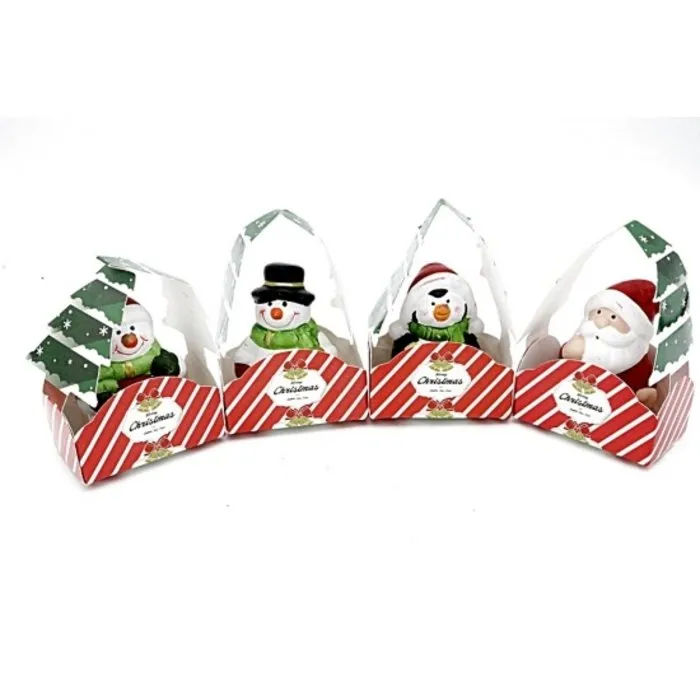 Kerstfiguur in zakje met kaartje