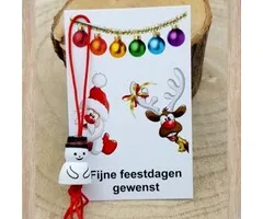 Kerstkaartje met een sneeuwpop