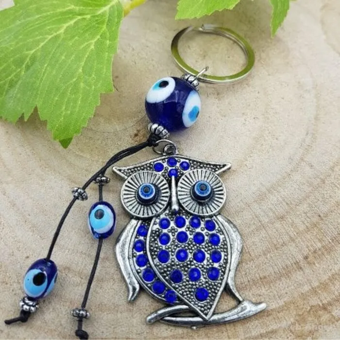 Boze oog sleutelhanger uil