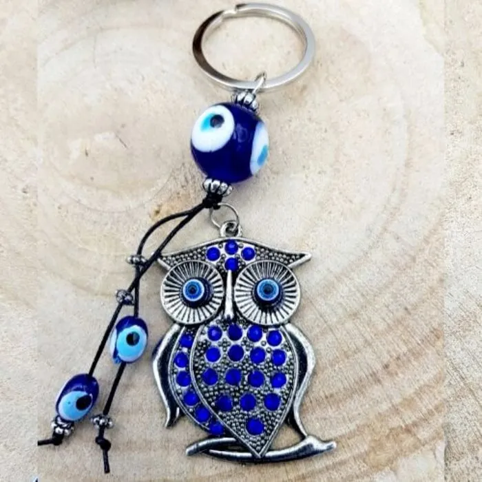 Boze oog sleutelhanger uil