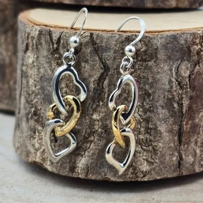 Verbonden harten oorbellen van zilver