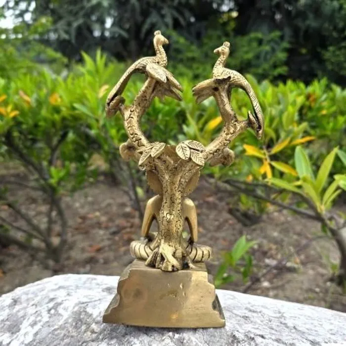 Boeddha onder boom brons