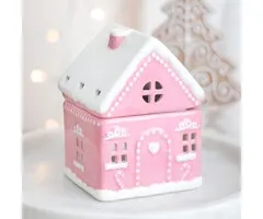 Roze peperkoekenhuis oliebrander