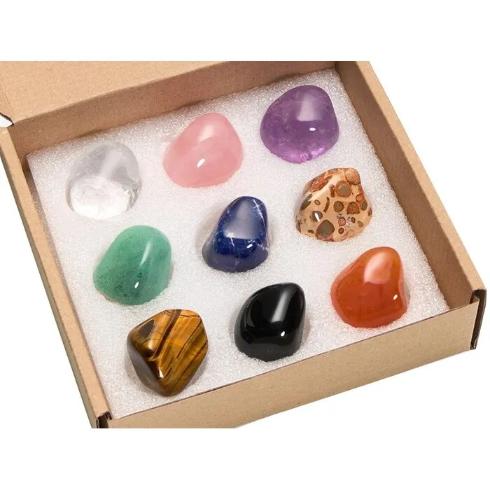 Verzameldoos met 9 trommelstenen van over de hele wereld