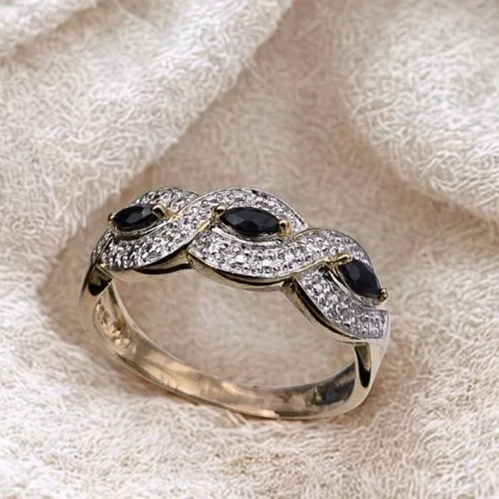 Ring zilver/goud met zwarte Saffier