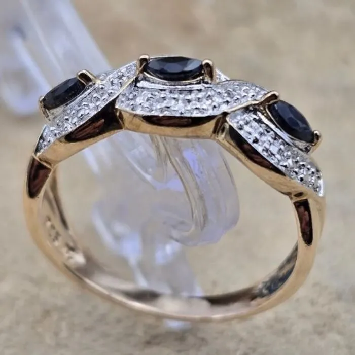 Ring zilver/goud met zwarte Saffier