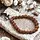 Mala armband rudraksha met boeddha hoofd