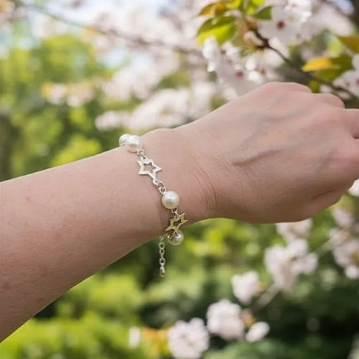 Armband zilver ster parel