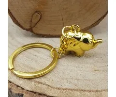 Olifant sleutelhanger metaal goudkleurig met kaartje