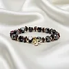 Armband hematiet granaat facet met ohm elastisch