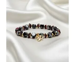 Armband hematiet granaat facet met ohm elastisch