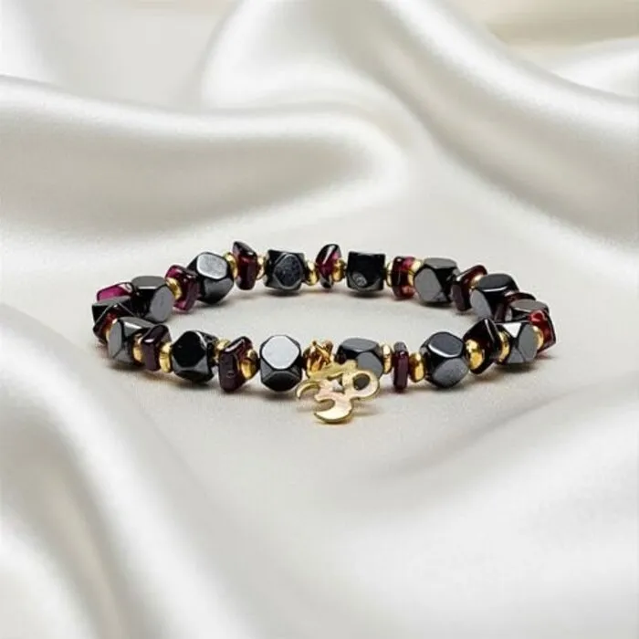 Armband hematiet granaat facet met ohm elastisch