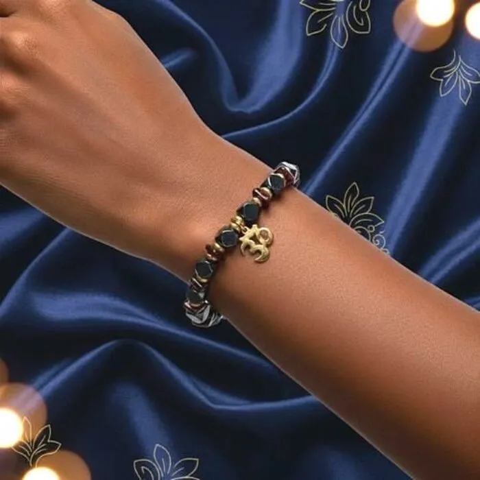 Armband hematiet granaat facet met ohm elastisch