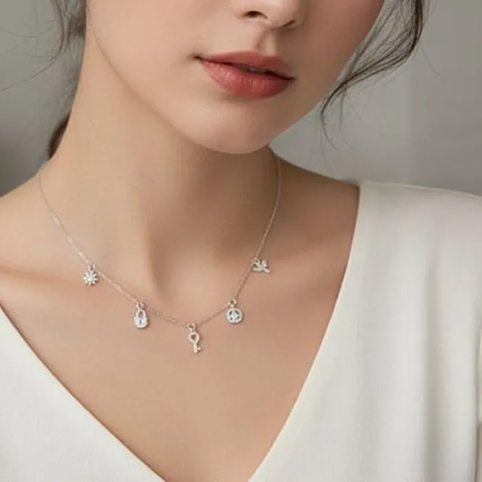 Halsketting zilver met 5 symbolen