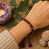 Armband Rudraksha en Amethist met aantrekkoord