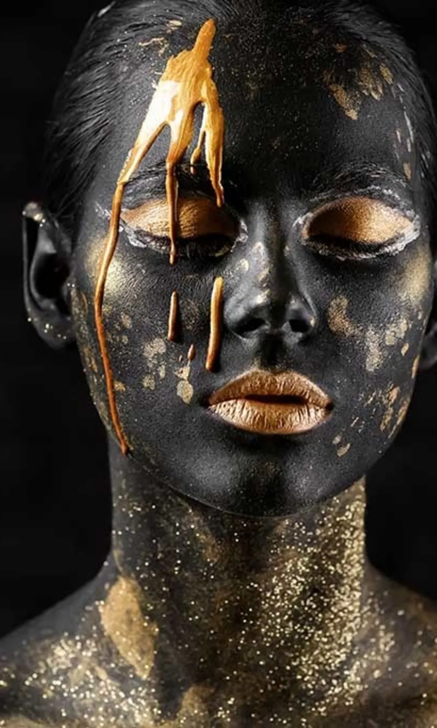 Black and gold face