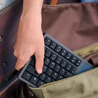 Kinesis Form geteilte kabellose Tastatur mit Touchpad